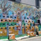 This vibrant wall mural is located in Mural Art's Lane